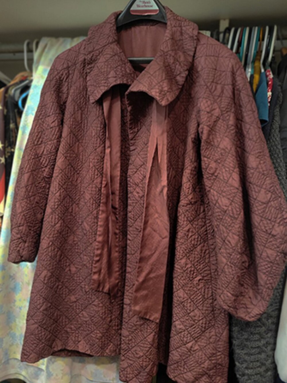 1960's Nylon type, light weight coat, rust/maroon color